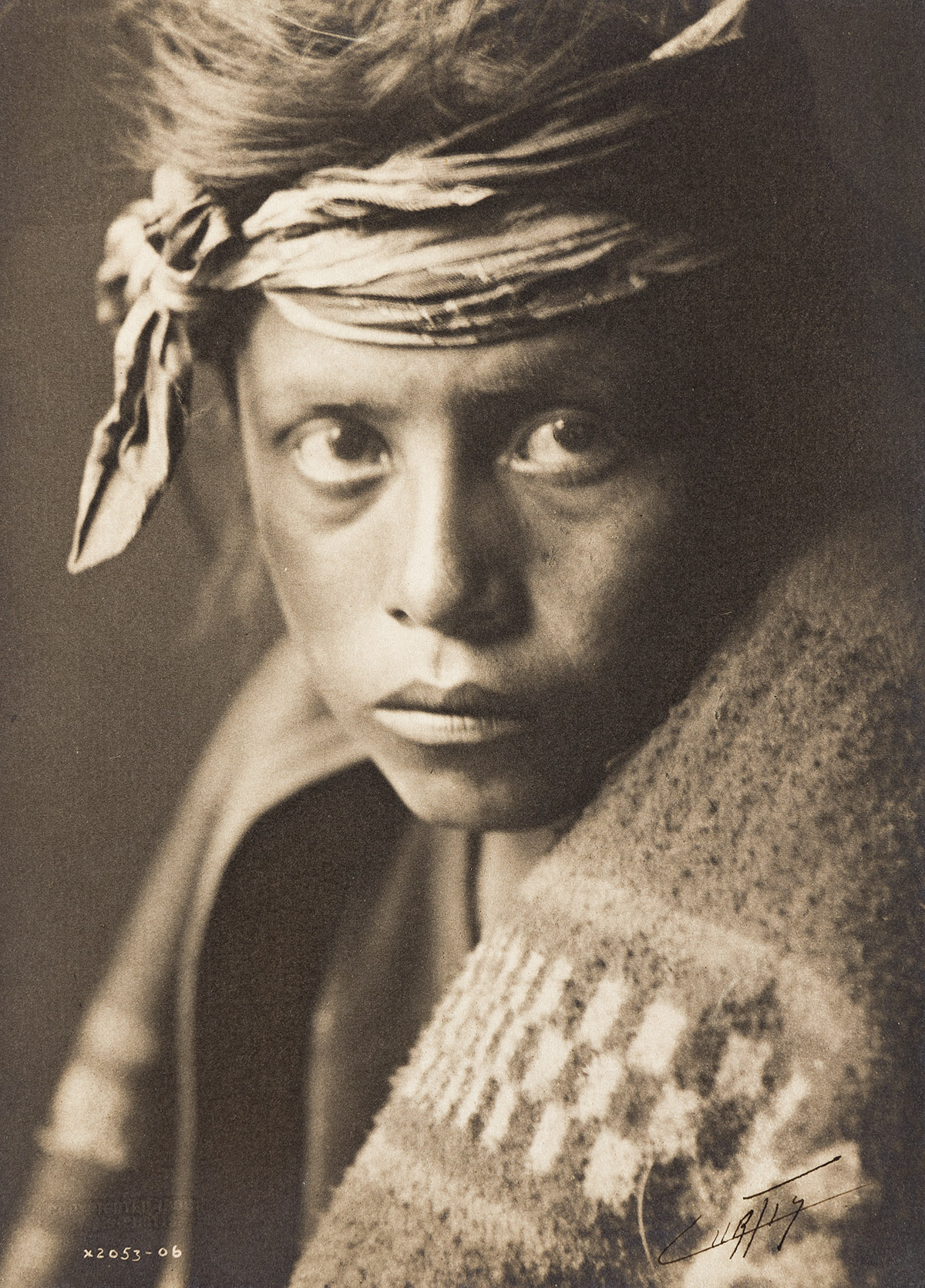 EDWARD S. CURTIS (1868-1952) A Young Navajo.